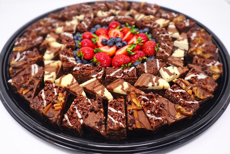 A gourmet dessert platter of brownies and sweets
