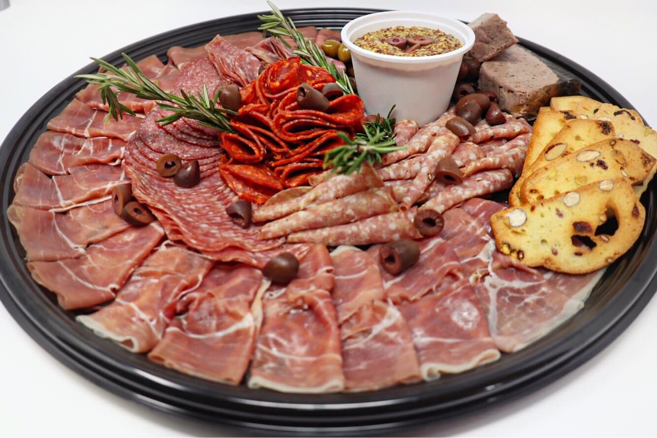 A gourmet charcuterie platter of cured meats