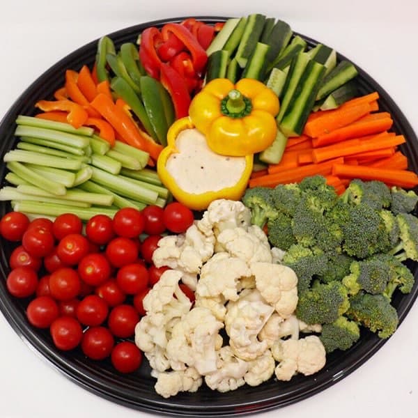 A vegetable crudité platter with dip